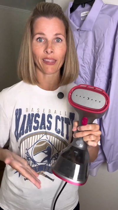 Customer steaming a dress shirt with Dr.Flash