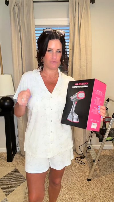 Customer with the Dr.Flash Vacuum Garment Steamer